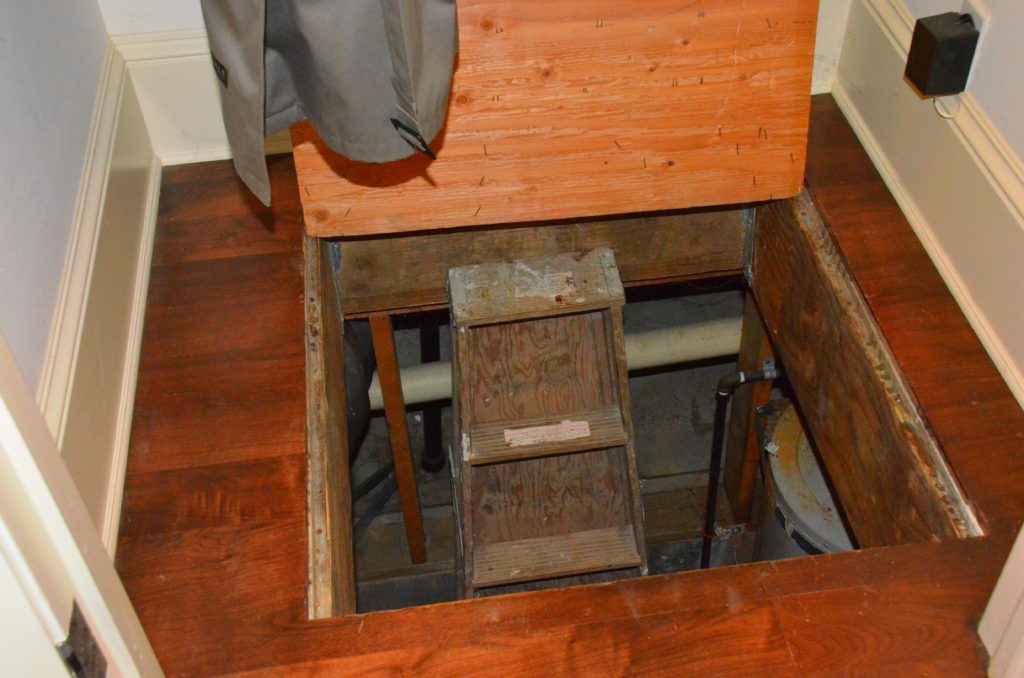 Image showing an open floor hatch leading to a crawlspace