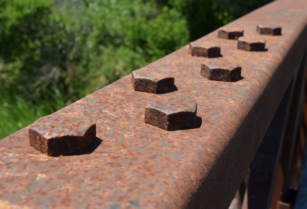 Rusted steel bridge with bolt fasteners Image of rusting corten steel bridge with fasteners