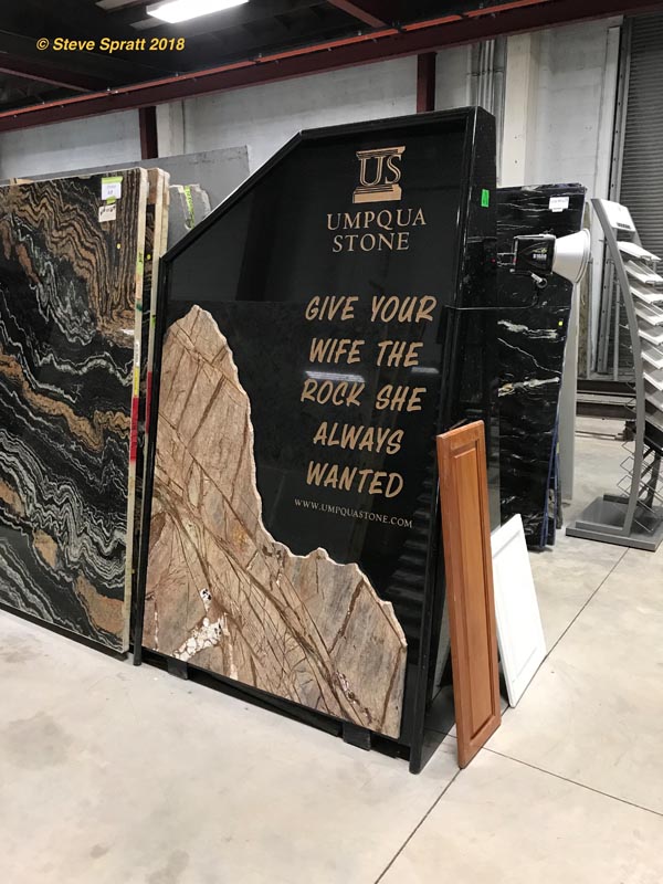 Image of stone counter advertisement saying "give your wife the rock she always wanted"