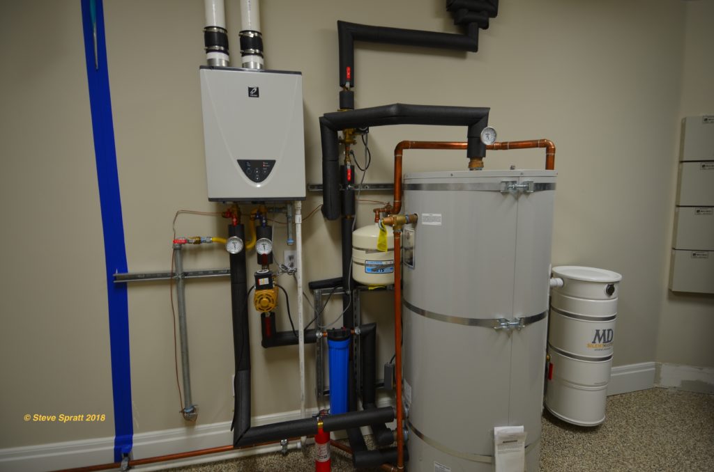 plumbing system with demand water heater and large storage tank Plumbing systems