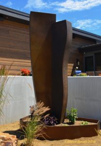 Image of bronze looking steel outdoor sculpture by Archie Held