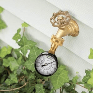 Water pressure test gauge Image of pressure gauge attached to hose bib